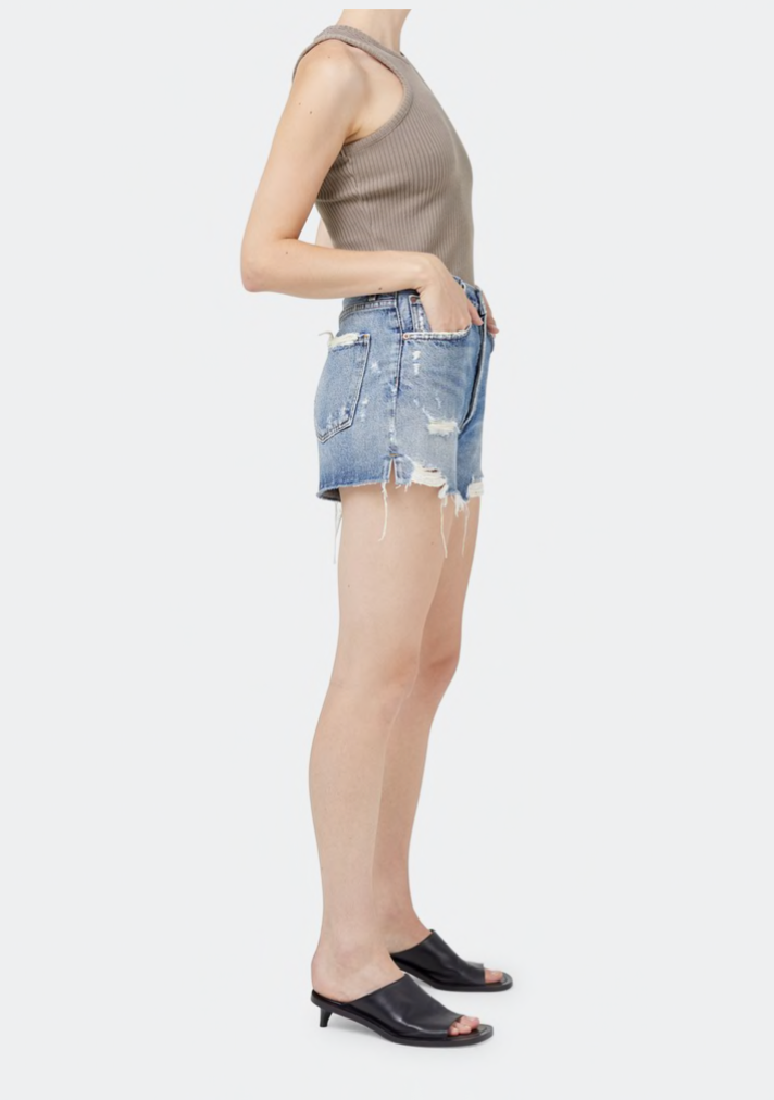 AGOLDE distressed high rise denim shorts in turmoil wash.