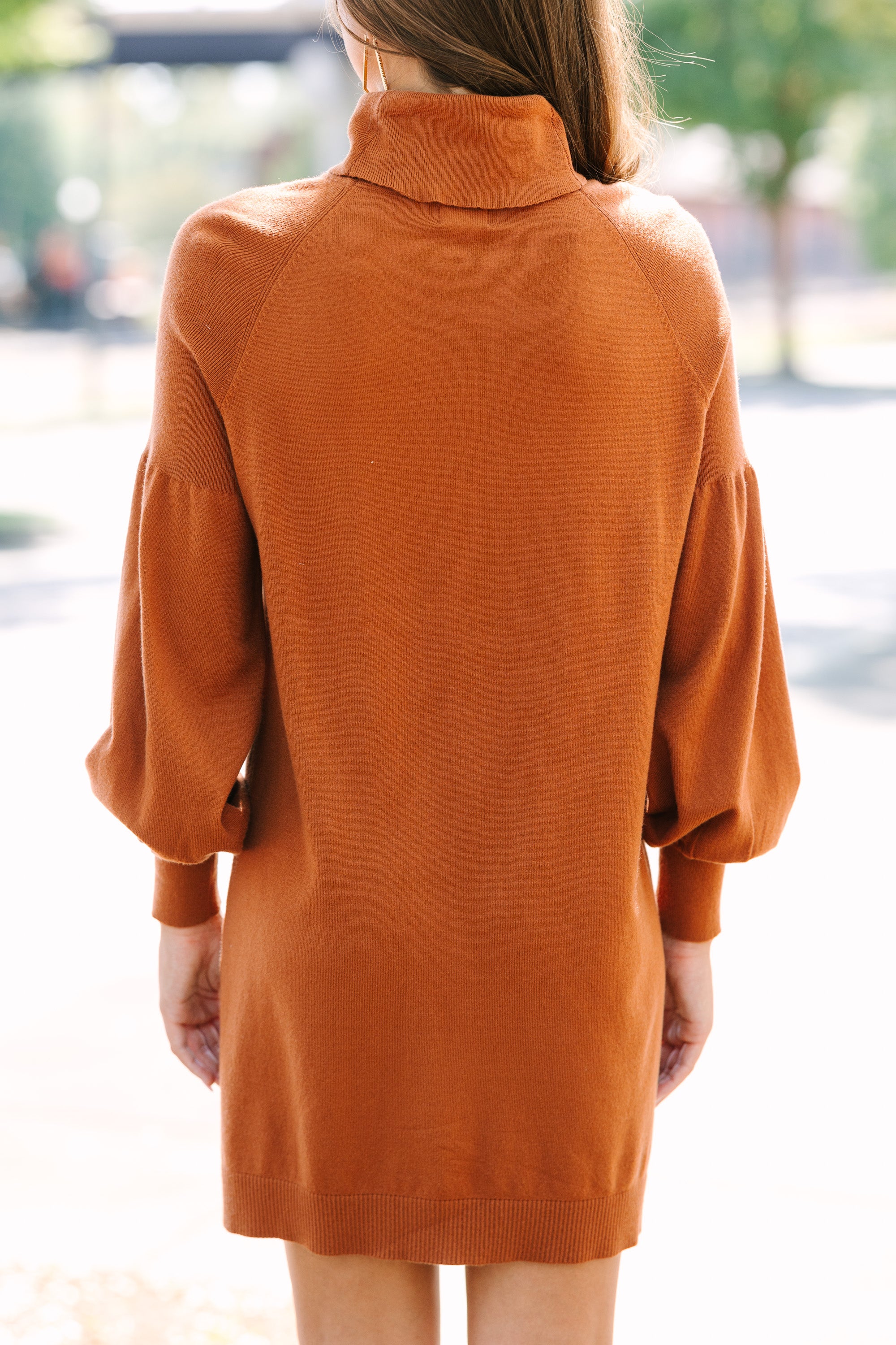 Camel Brown Sweater Dress: A stylish choice for any occasion.