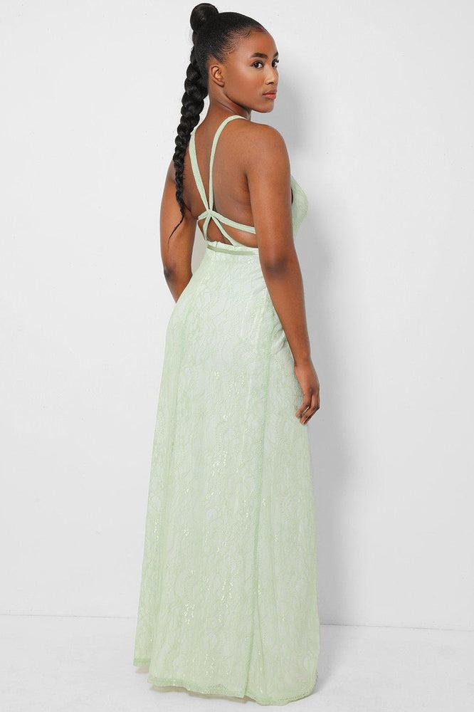 Green lace maxi dress with delicate overlay and wrap front.