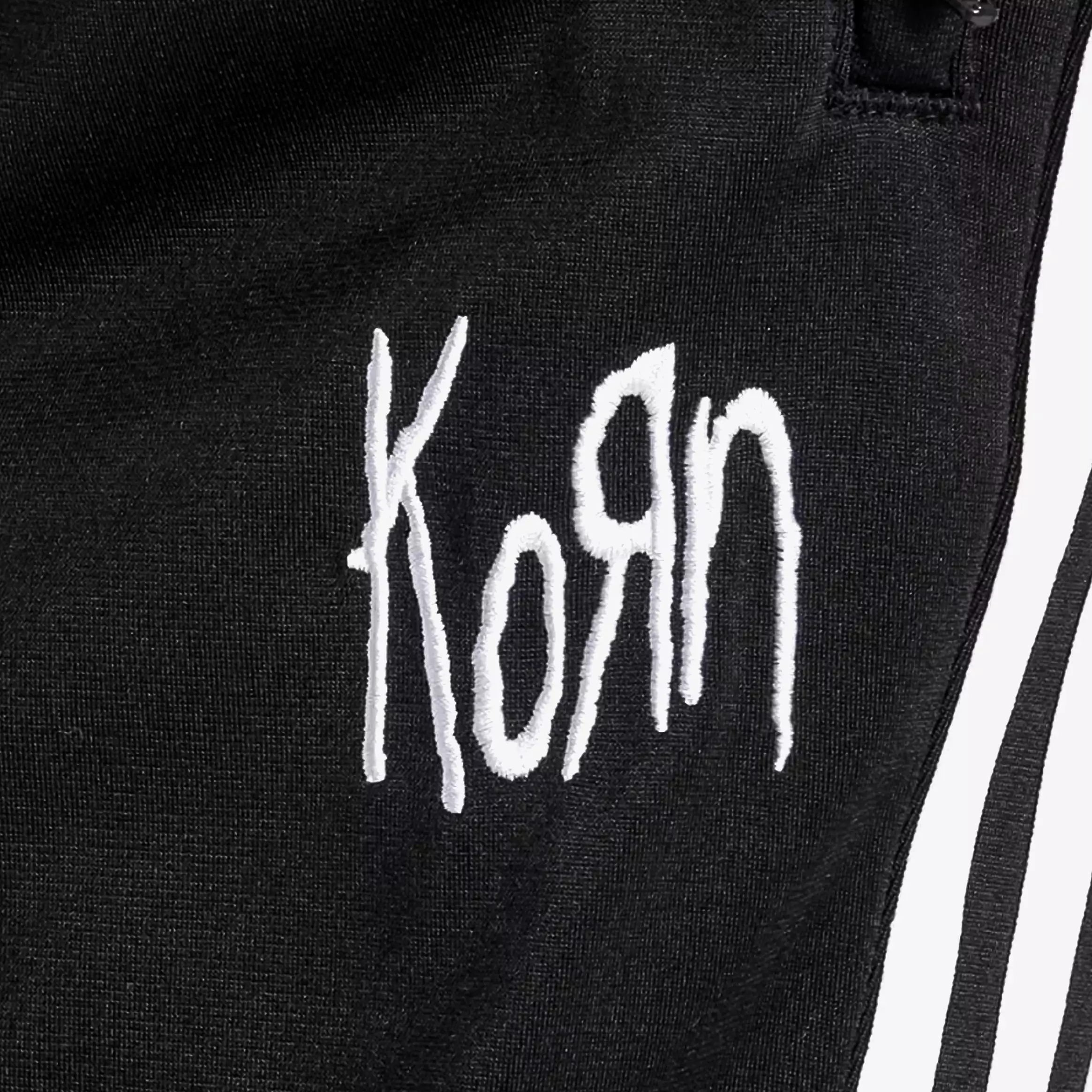 Keywords: Korn Men's Pants, Black/White Track Pants.