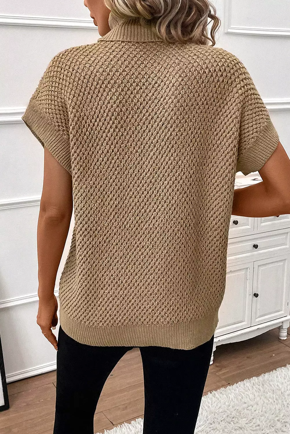 Khaki short sleeve turtleneck sweater.