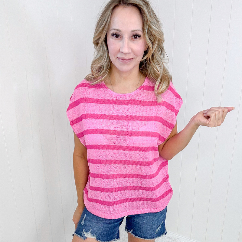 Red and pink striped sleeveless sweater.