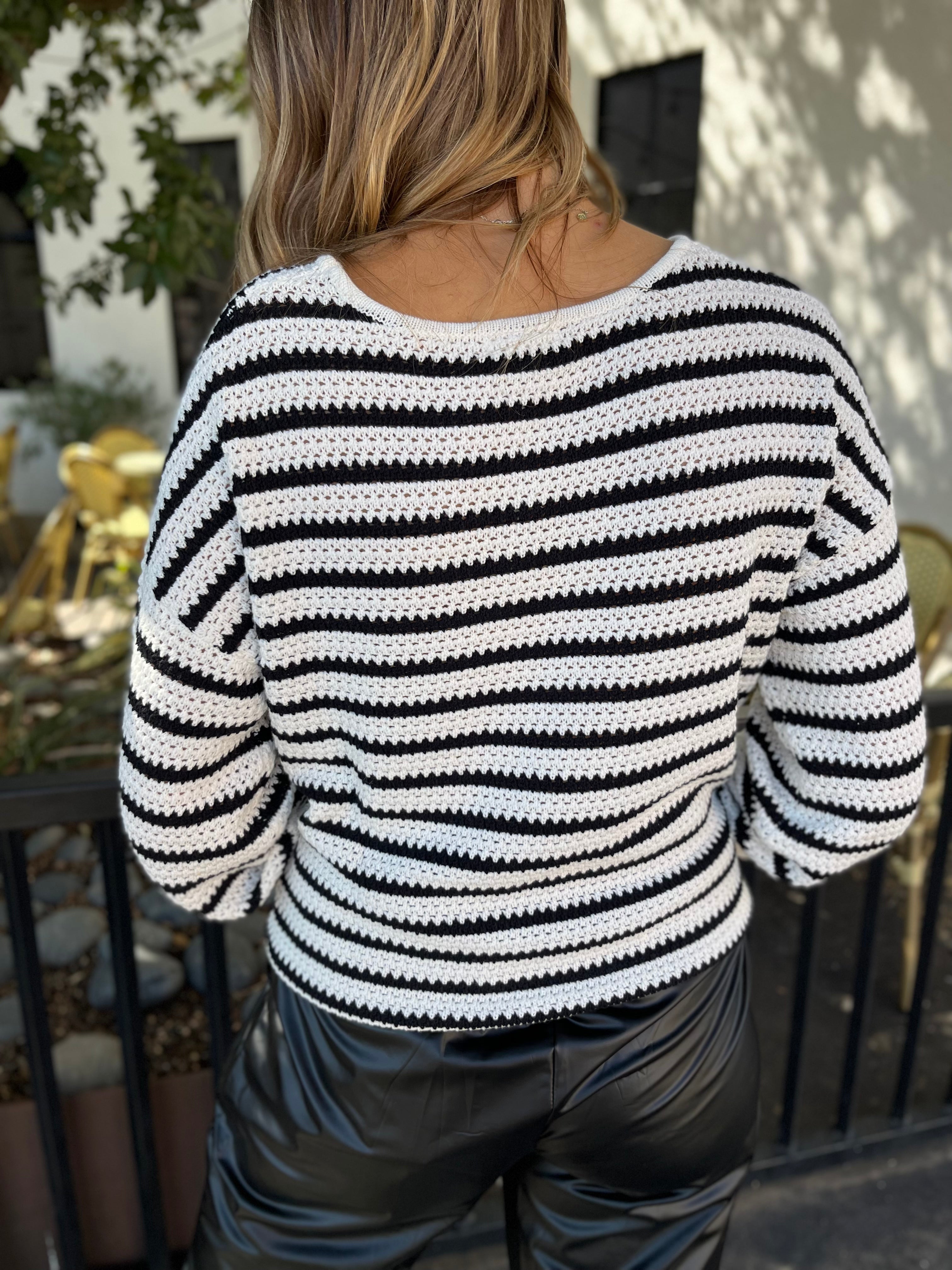 relaxed black striped knit sweater