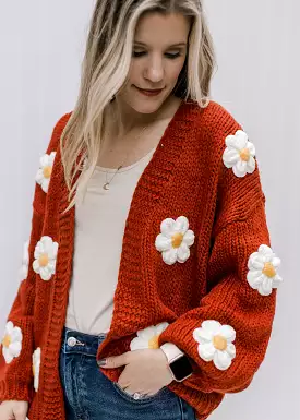 Rust Daisy Cardigan can be rewritten as Stylish Rust-Colored Daisy Patterned Cardigan for better Google SEO results.