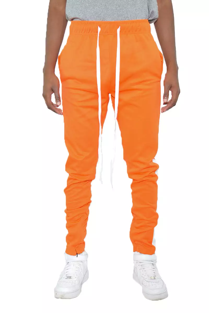 Track pants with a single stripe