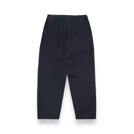 Universal Works navy pleated track pant 29181 in winter twill fabric.